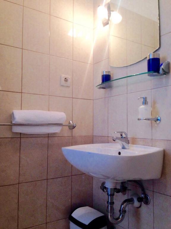 Koupelna v ubytování APARTMENTS LUMA 1