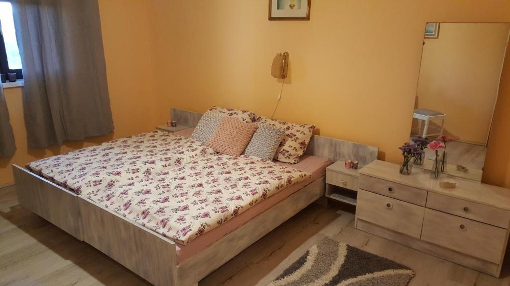 Postel nebo postele na pokoji v ubytování Apartment Kristina