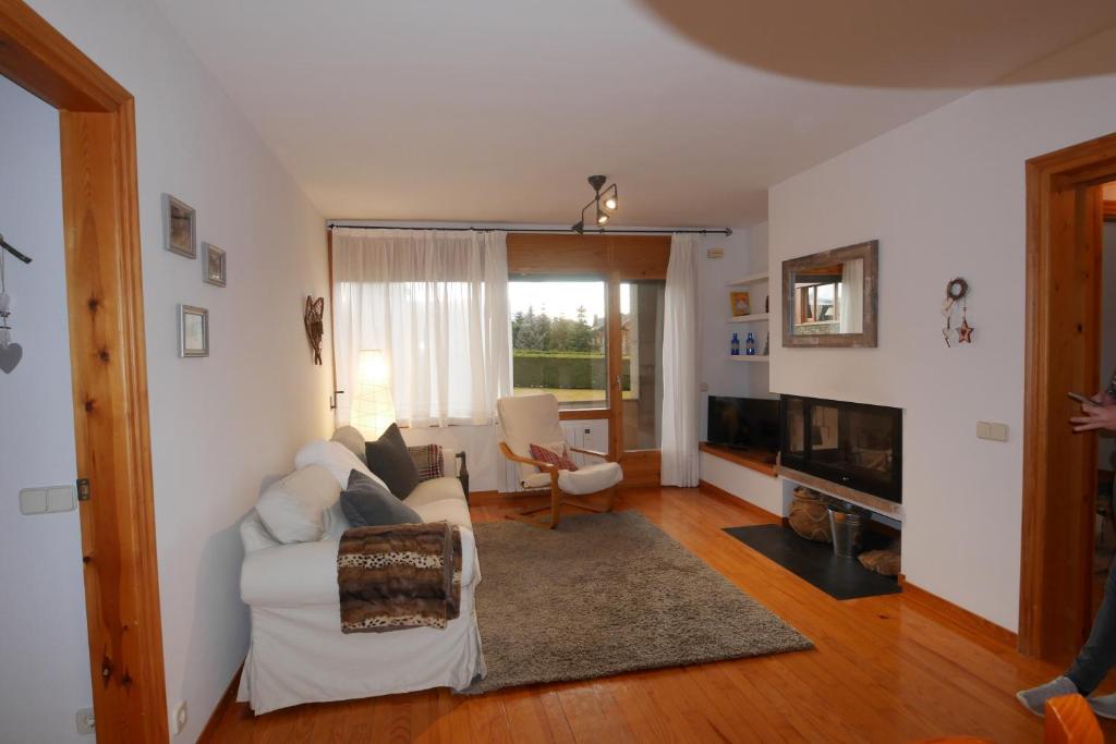 Posezení v ubytování Cozy Apartment in Alp