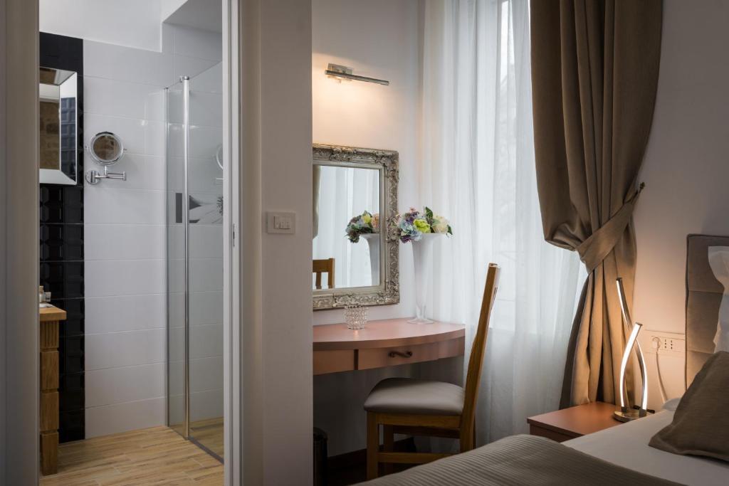 Posteľ alebo postele v izbe v ubytovaní ID Regal Residence
