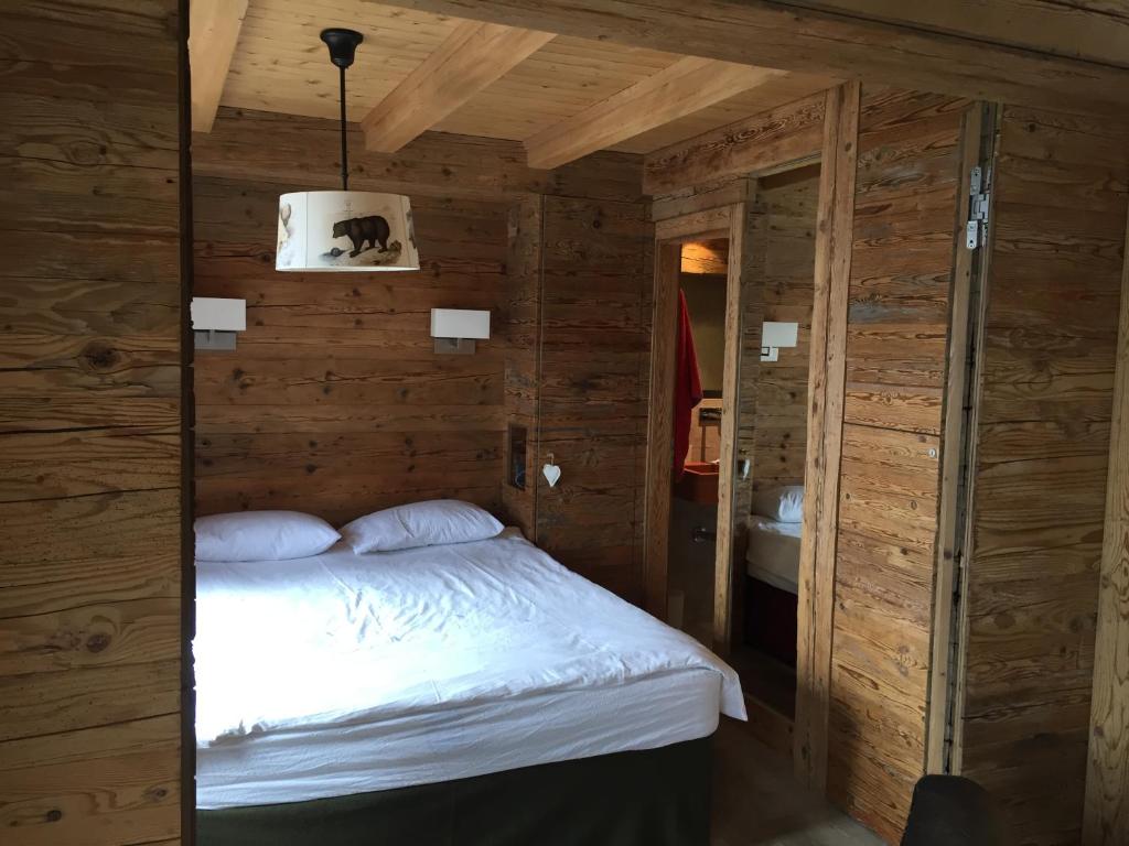 Postel nebo postele na pokoji v ubytování Verbier Valmont in center