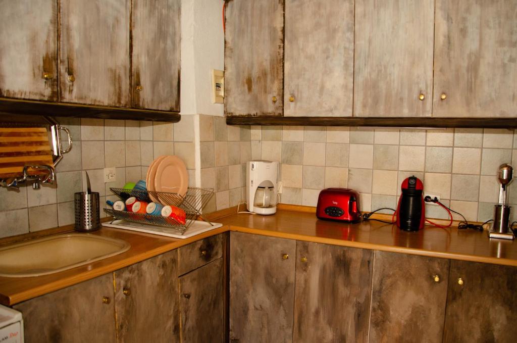 Kuchyň nebo kuchyňský kout v ubytování Kallisto Traditional Guesthouse