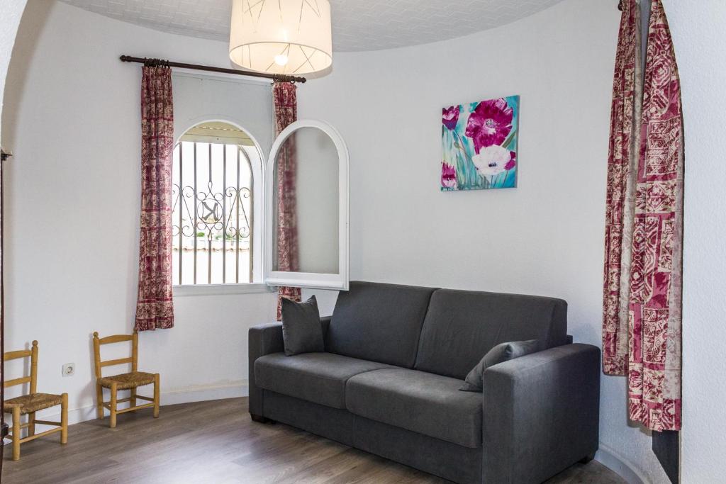Posezení v ubytování Empurialola -Encantadora Casa con jardin cerca del centro -142