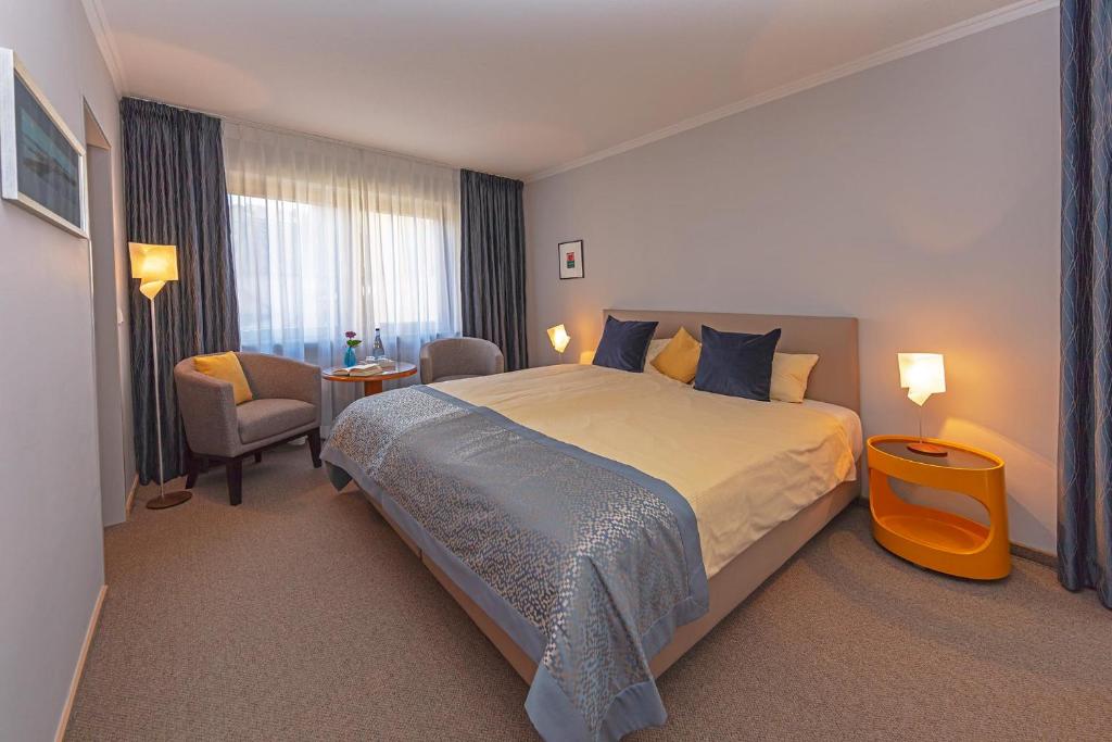 Postel nebo postele na pokoji v ubytování Wittlers Hotel