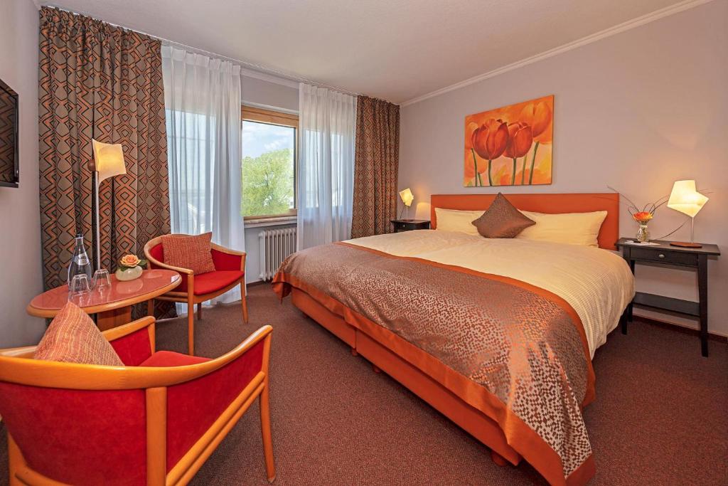 Postel nebo postele na pokoji v ubytování Wittlers Hotel