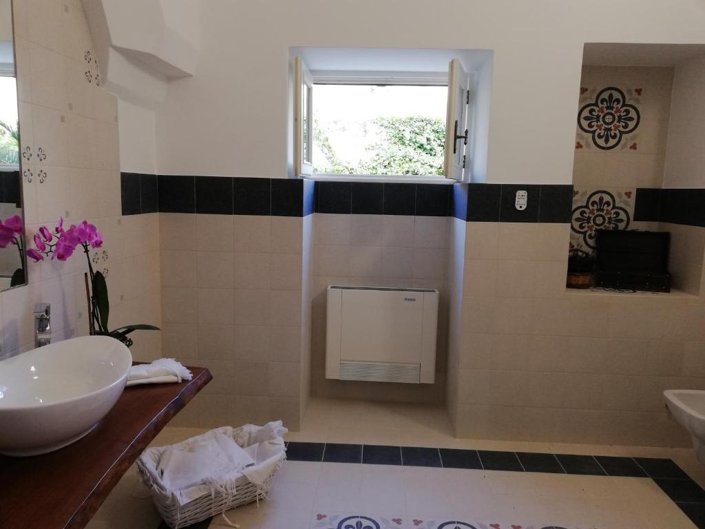 Koupelna v ubytování Agorà Suites & Apartments