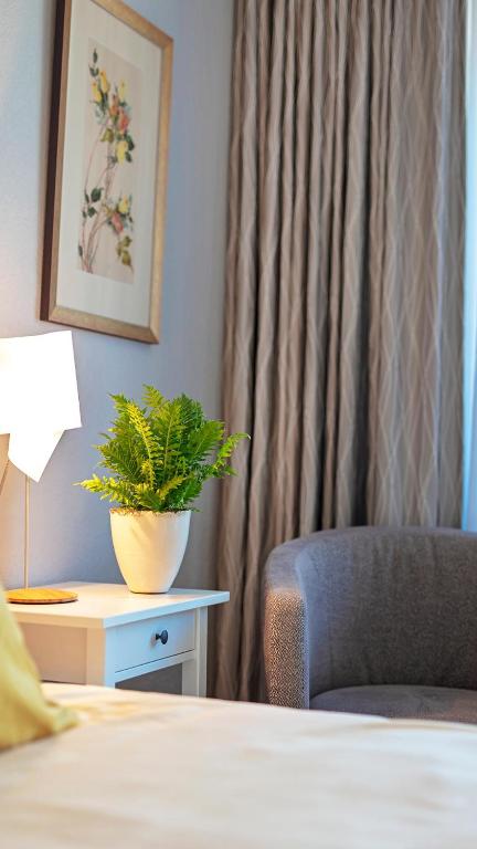 Postel nebo postele na pokoji v ubytování Wittlers Hotel