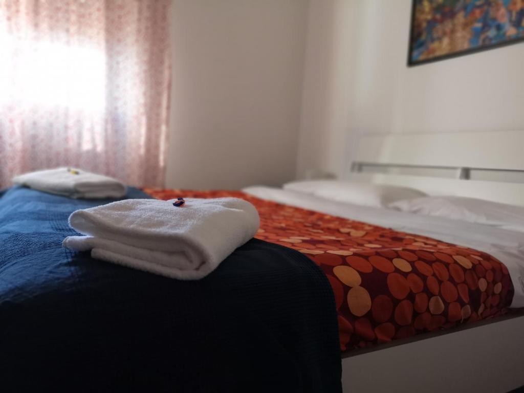 Postel nebo postele na pokoji v ubytování B&B Colombo