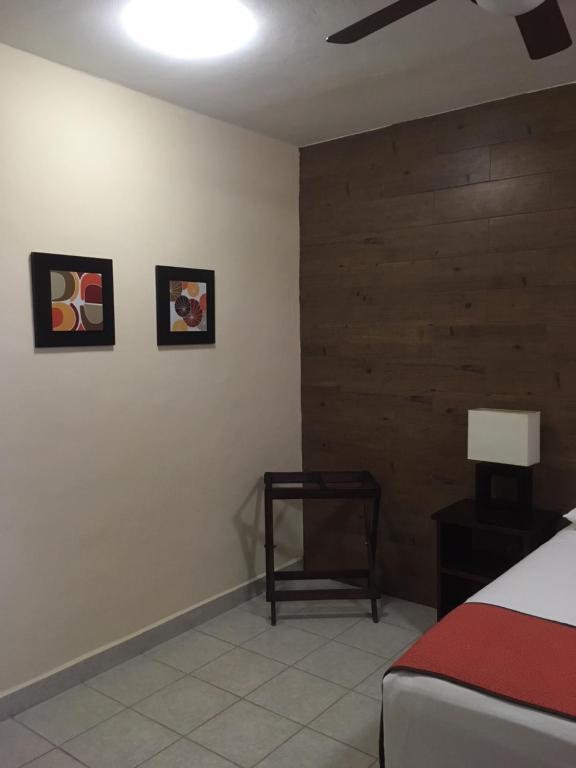 Postel nebo postele na pokoji v ubytování Hotel Tuparenda