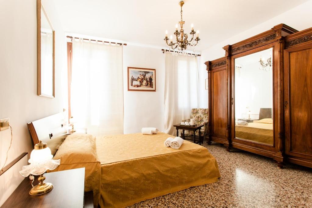 Postel nebo postele na pokoji v ubytování Prince Apartments