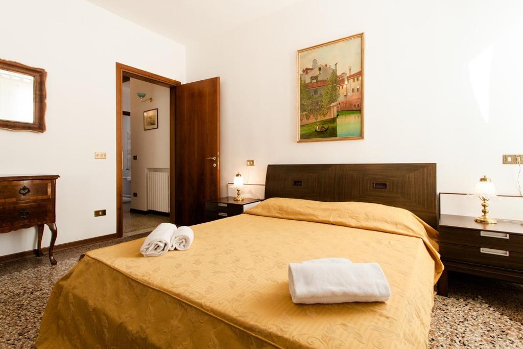Postel nebo postele na pokoji v ubytování Prince Apartments