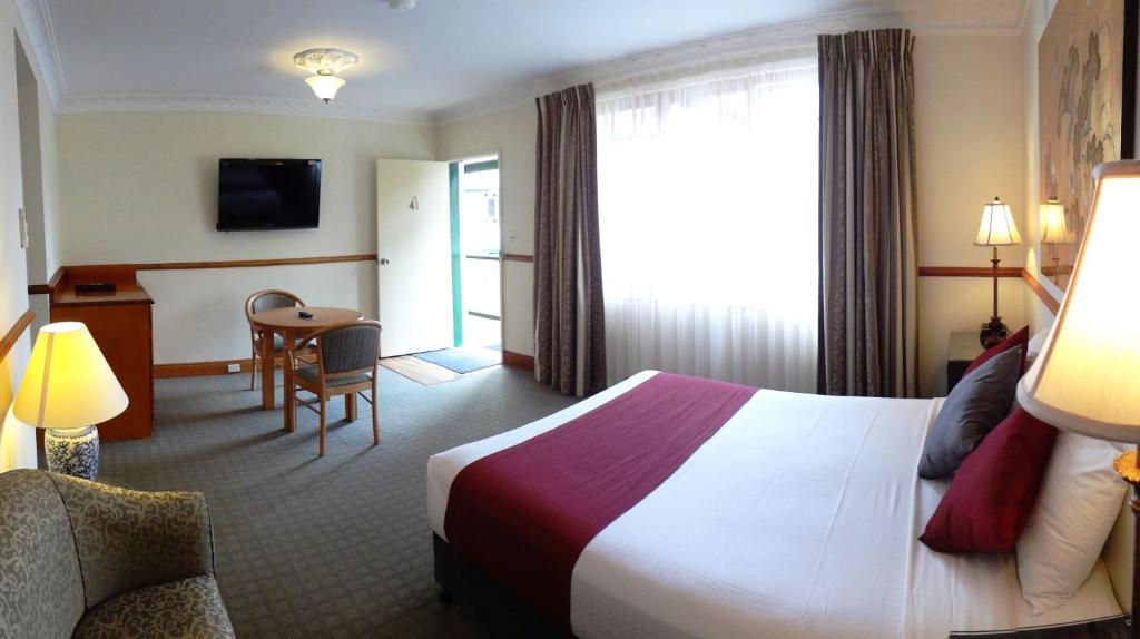 Postel nebo postele na pokoji v ubytování Three Explorers Motel