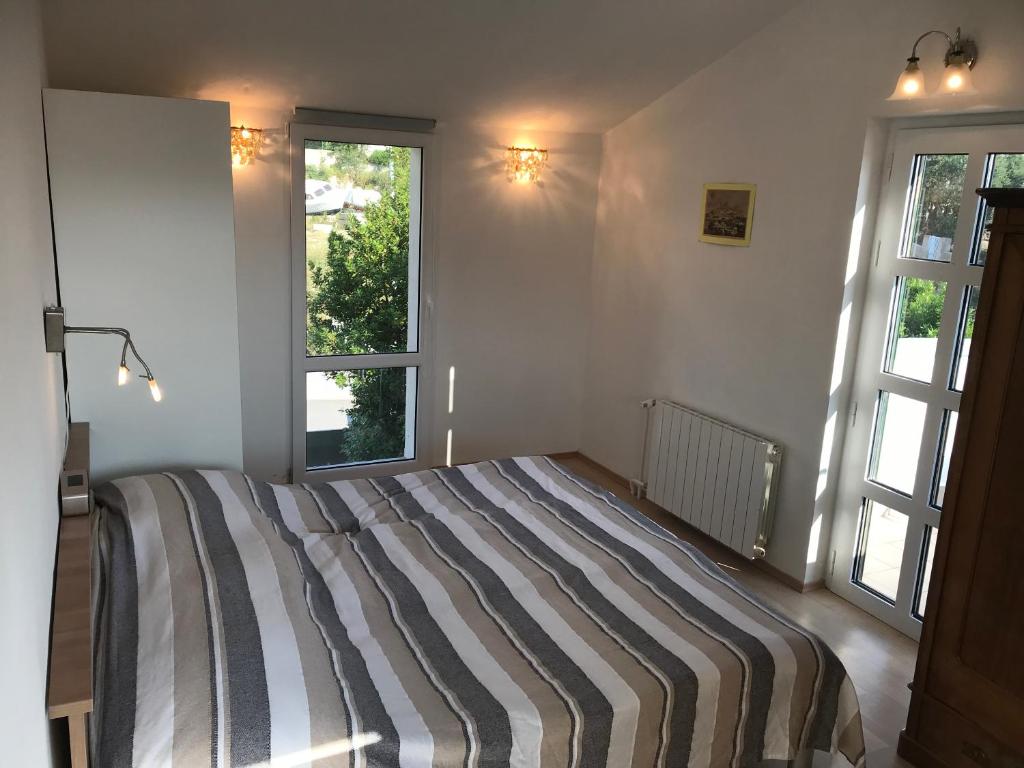 Posteľ alebo postele v izbe v ubytovaní Appartement Mila