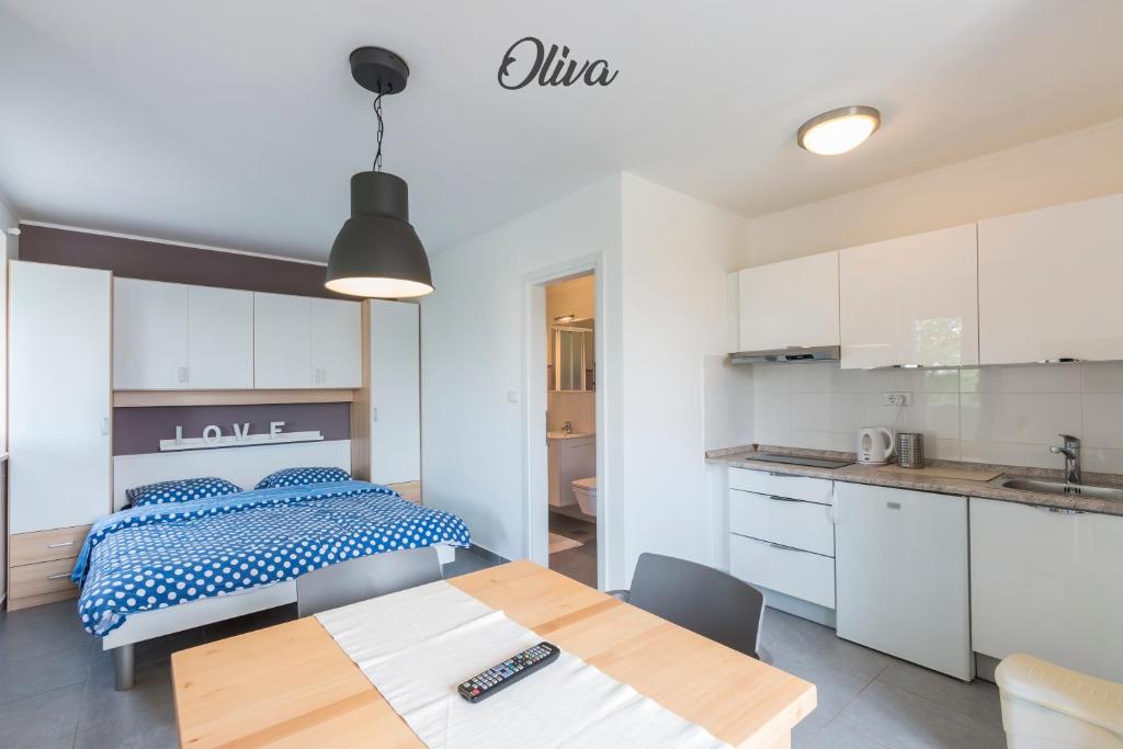 Łóżko lub łóżka w pokoju w obiekcie Apartment Lux More