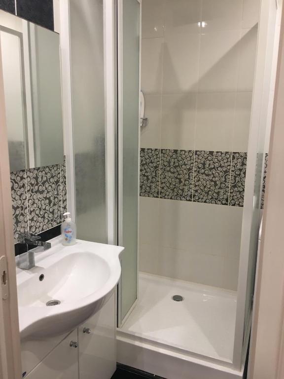Kúpeľňa v ubytovaní Igényes Lakás