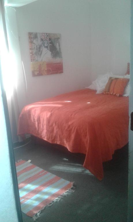 Postel nebo postele na pokoji v ubytování Habitaciones Florencia