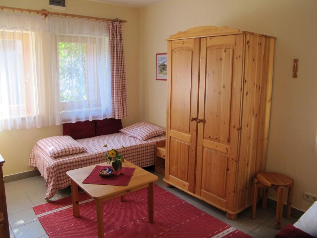 Posteľ alebo postele v izbe v ubytovaní Foki Apartman