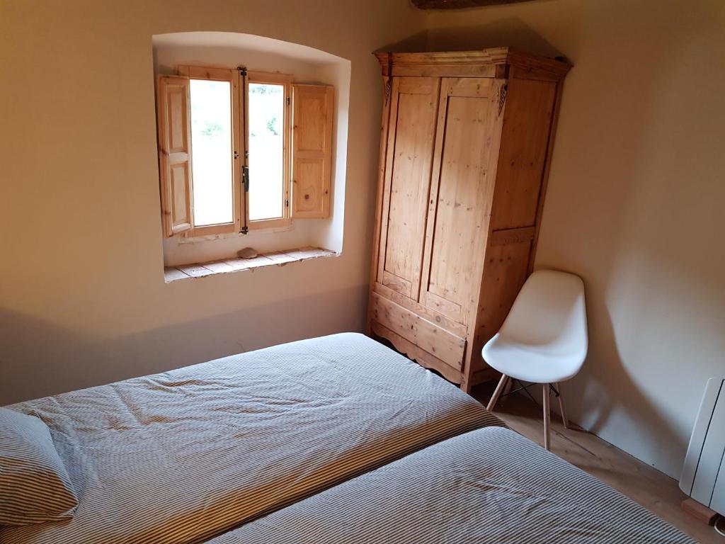 Postel nebo postele na pokoji v ubytování Can Jaume Porxo