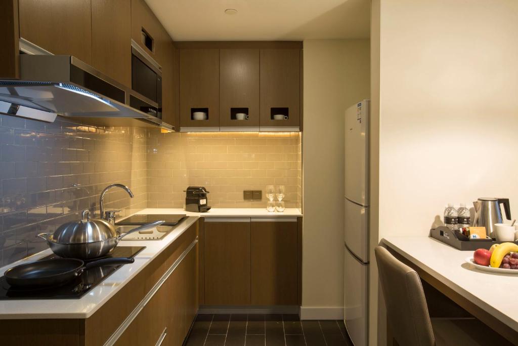 Kuchyň nebo kuchyňský kout v ubytování Hyatt House Shanghai New Hongqiao