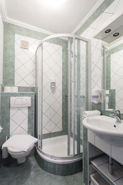 Koupelna v ubytování Hotel Pass Lueg