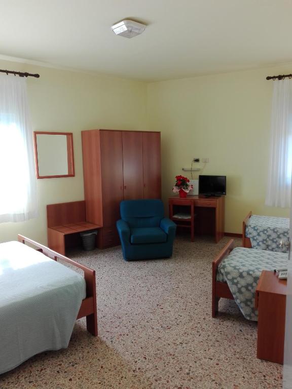 Postel nebo postele na pokoji v ubytování Hotel Senio