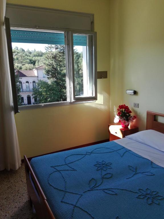 Postel nebo postele na pokoji v ubytování Hotel Senio