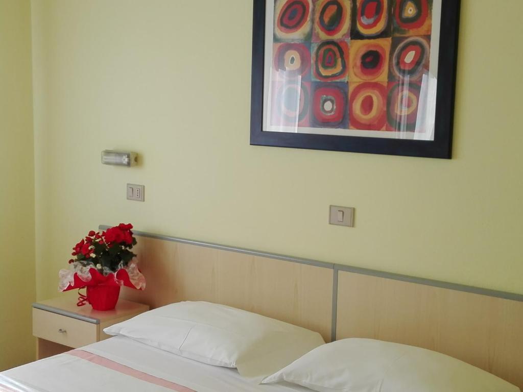 Postel nebo postele na pokoji v ubytování Hotel Senio