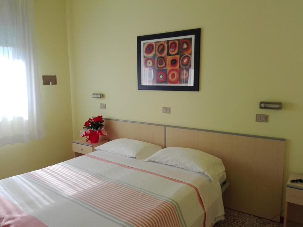 Postel nebo postele na pokoji v ubytování Hotel Senio