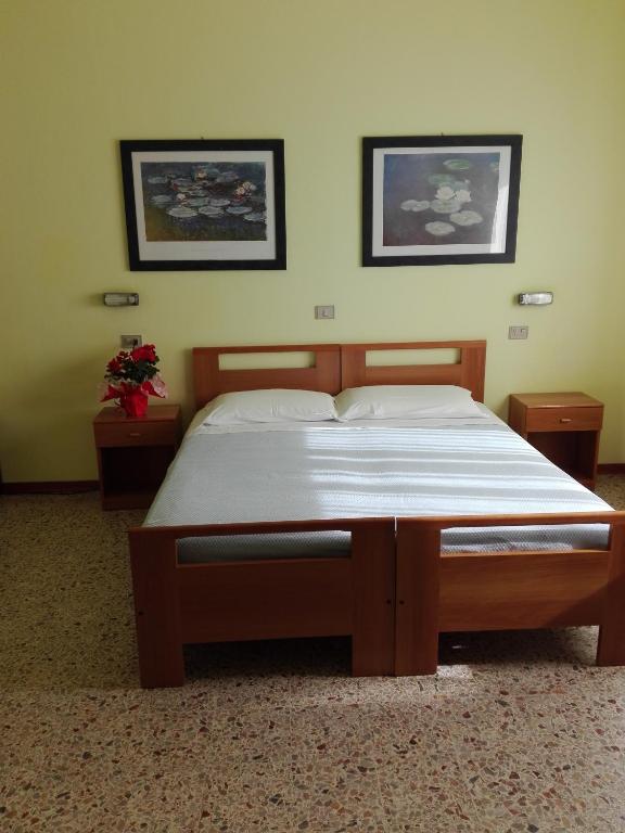 Postel nebo postele na pokoji v ubytování Hotel Senio