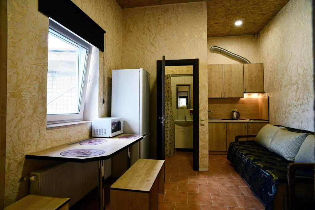 Postel nebo postele na pokoji v ubytování Logovo Hostel