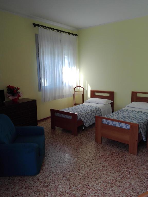 Postel nebo postele na pokoji v ubytování Hotel Senio