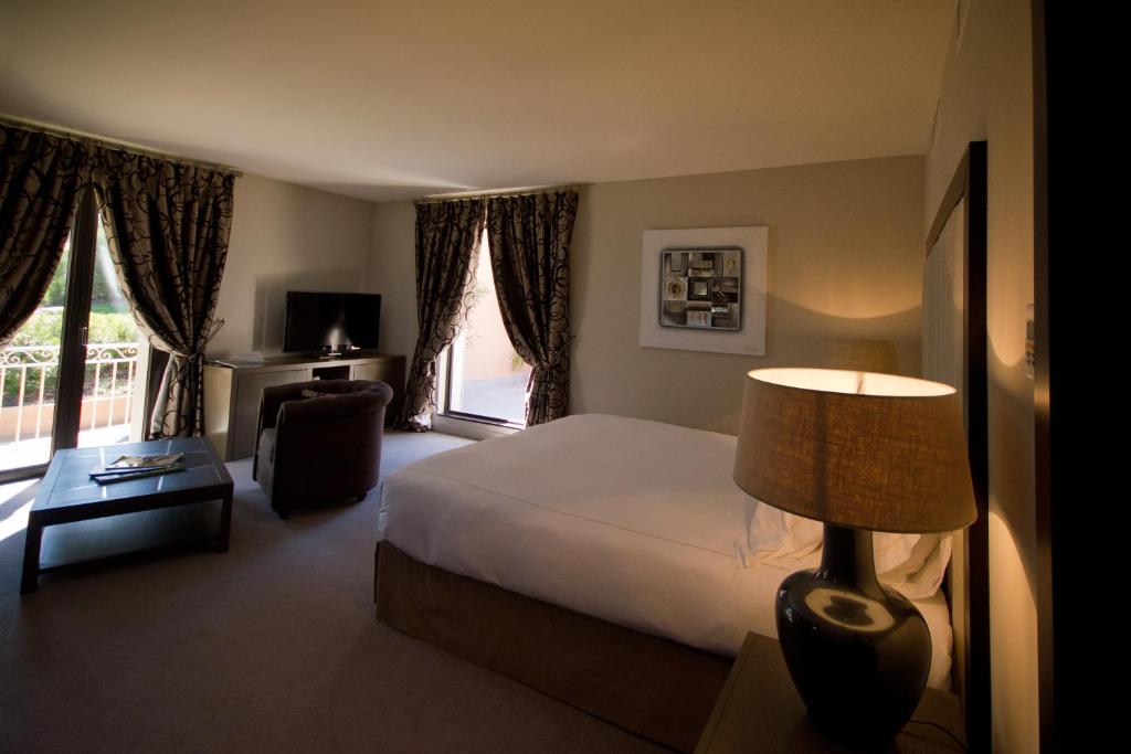 Postel nebo postele na pokoji v ubytování Le Daya Hotel & Spa - Boutique Hotel