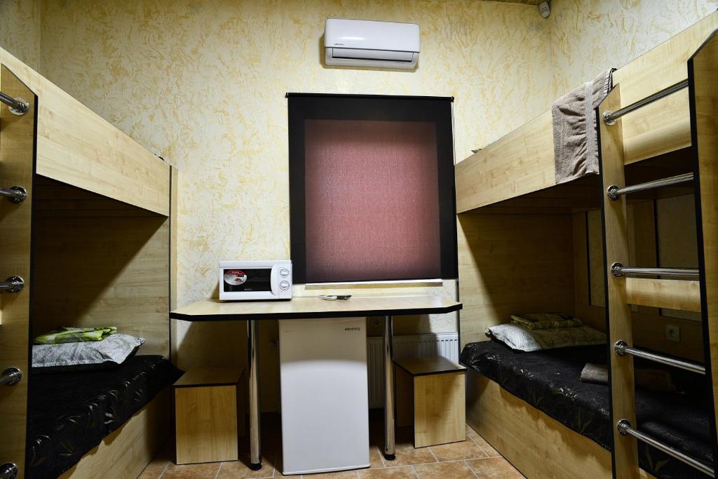 Kuchyň nebo kuchyňský kout v ubytování Logovo Hostel