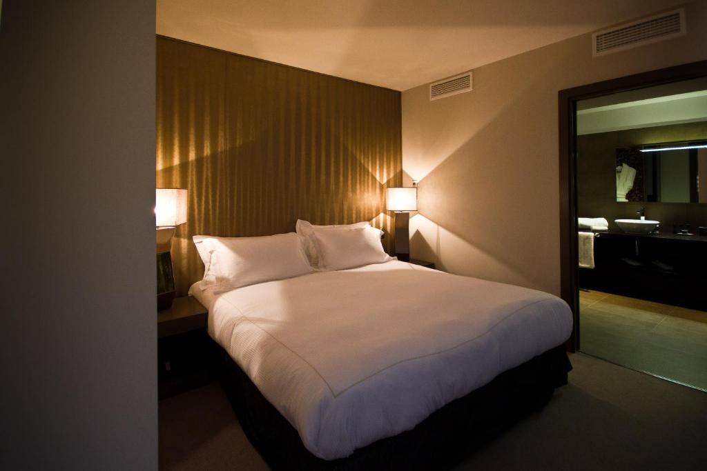 Postel nebo postele na pokoji v ubytování Le Daya Hotel & Spa - Boutique Hotel