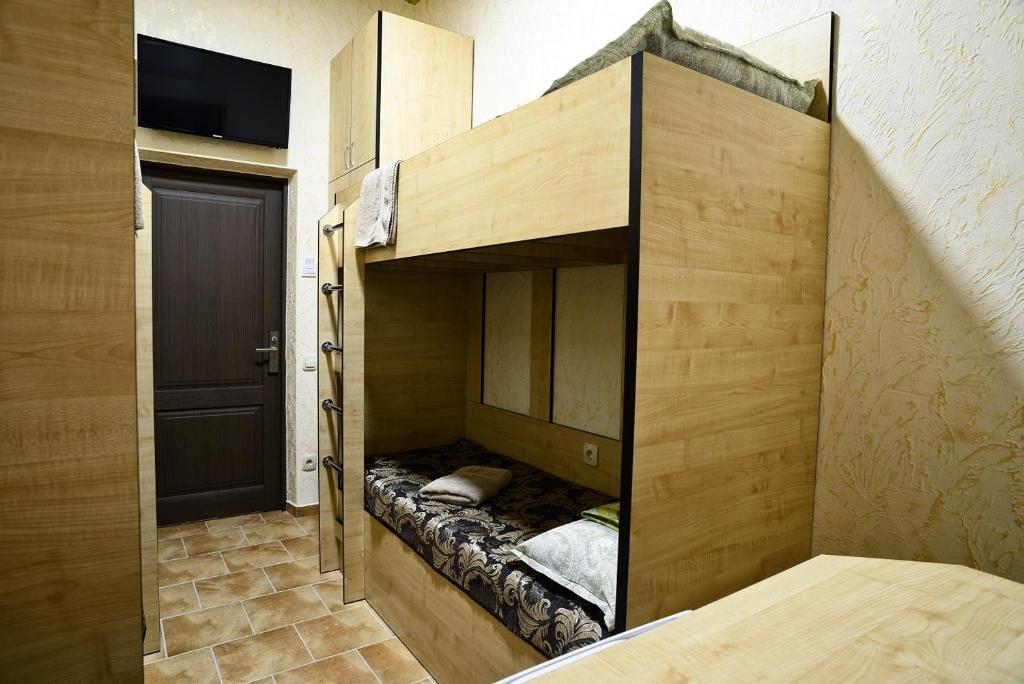 Postel nebo postele na pokoji v ubytování Logovo Hostel