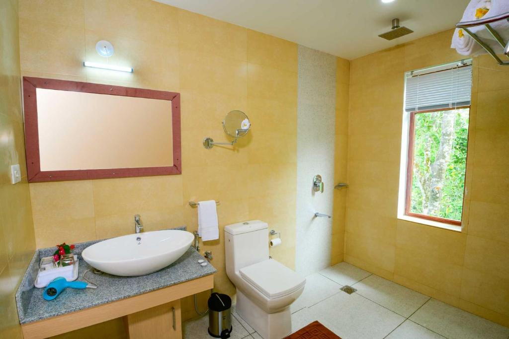 Koupelna v ubytování Spice Villa Thekkady