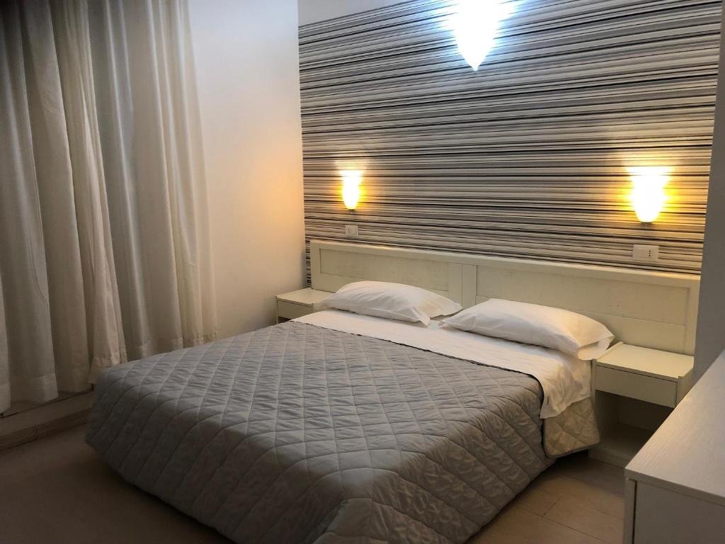 Llit o llits en una habitació de Hotel Stella Polare