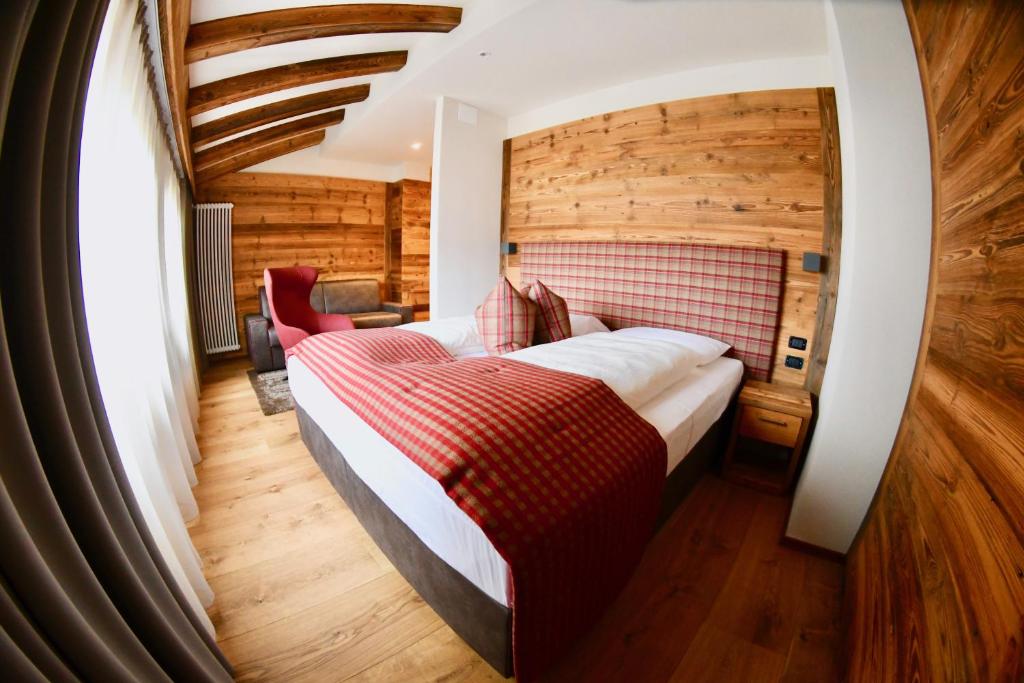 Postel nebo postele na pokoji v ubytování Hotel Alpenrose Wellness