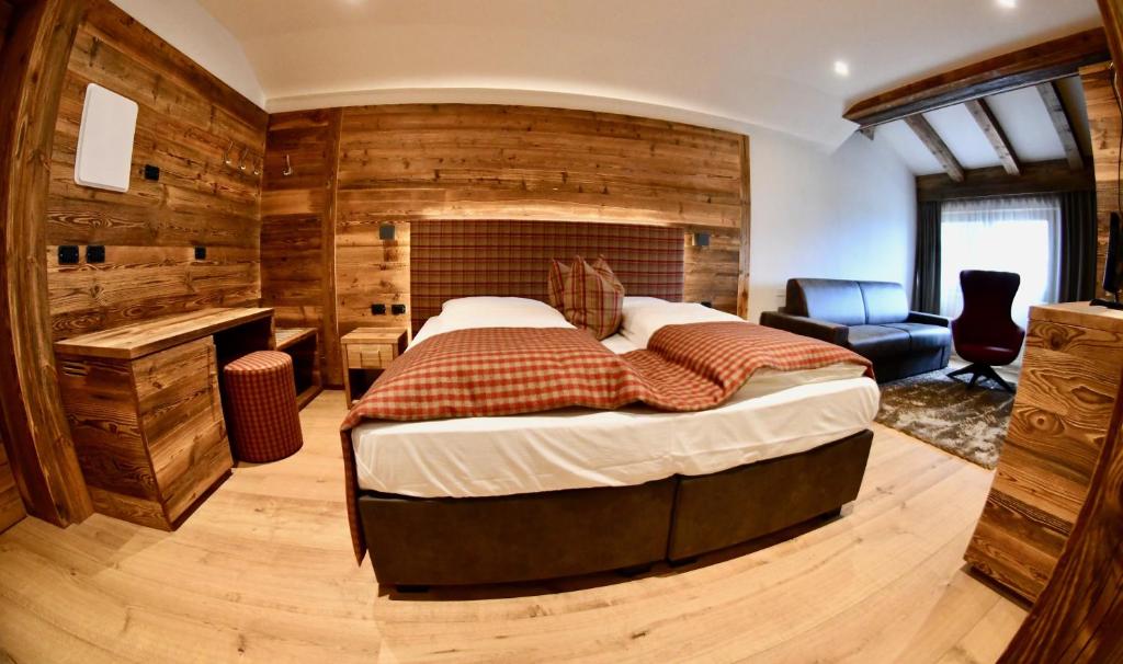 Postel nebo postele na pokoji v ubytování Hotel Alpenrose Wellness