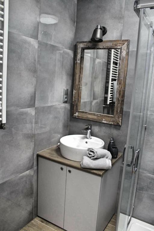 Kúpeľňa v ubytovaní Apartamenty EverySky - Osiedle Podgórze 1D