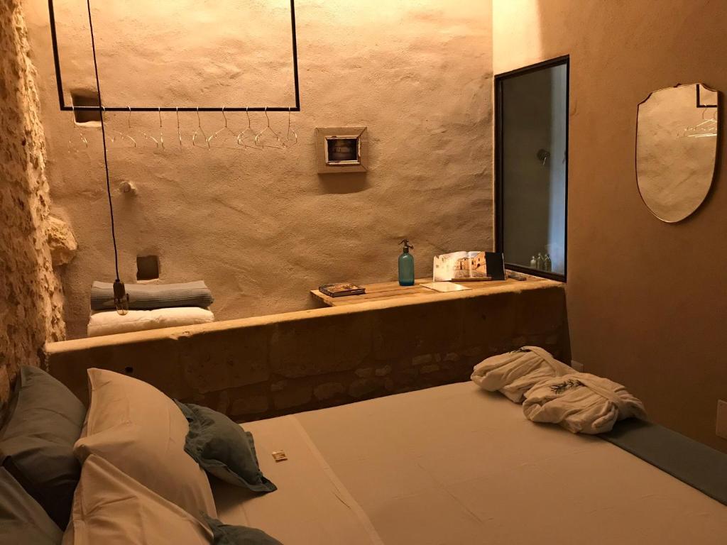 Posteľ alebo postele v izbe v ubytovaní Casa Farfaglia
