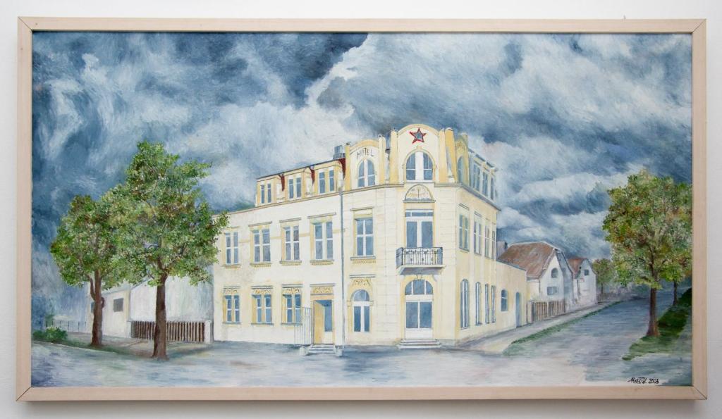 a painting of a white building on a street at Hotel Modrá hvězda Sadská in Sadská