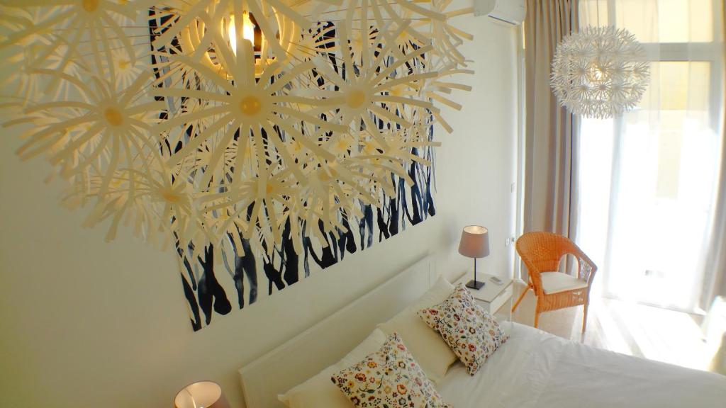 Postel nebo postele na pokoji v ubytování R1102ERI by euroresort