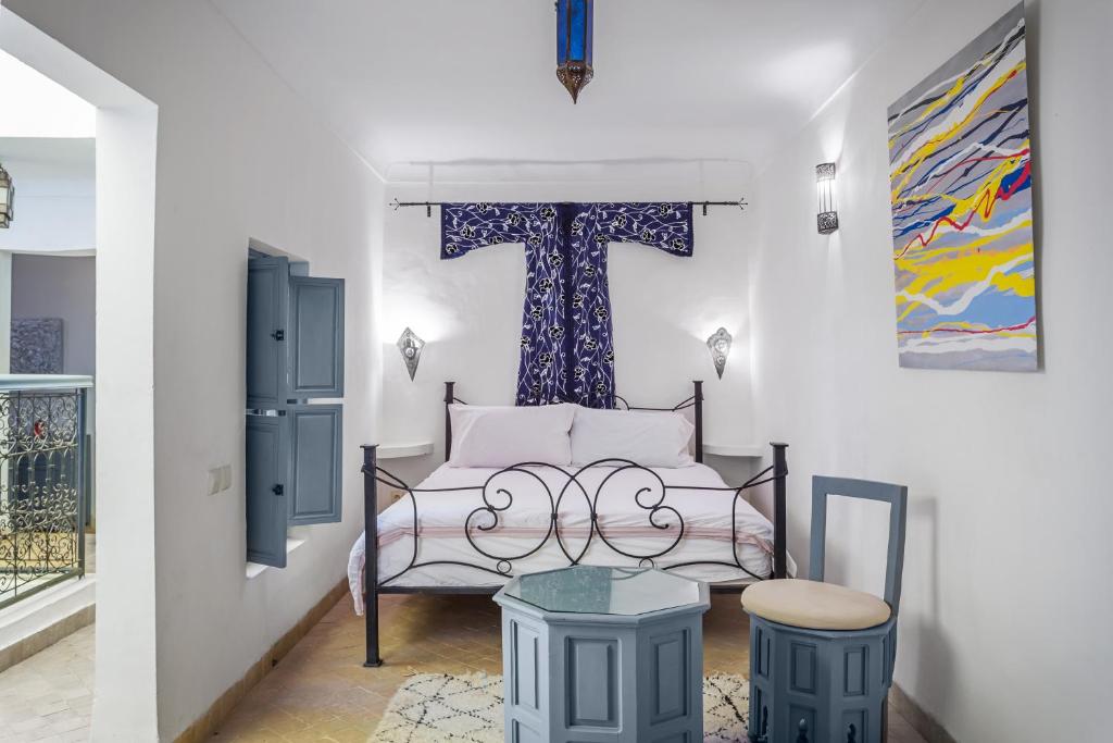 Postel nebo postele na pokoji v ubytování Riad Linda