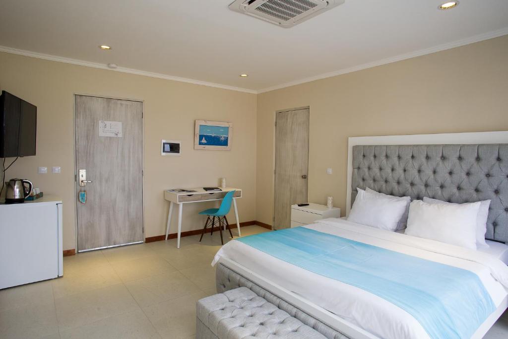Postel nebo postele na pokoji v ubytování Hotel Islander Bonaire