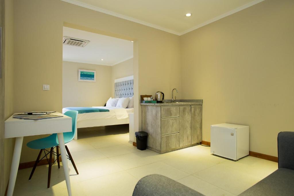 Postel nebo postele na pokoji v ubytování Hotel Islander Bonaire