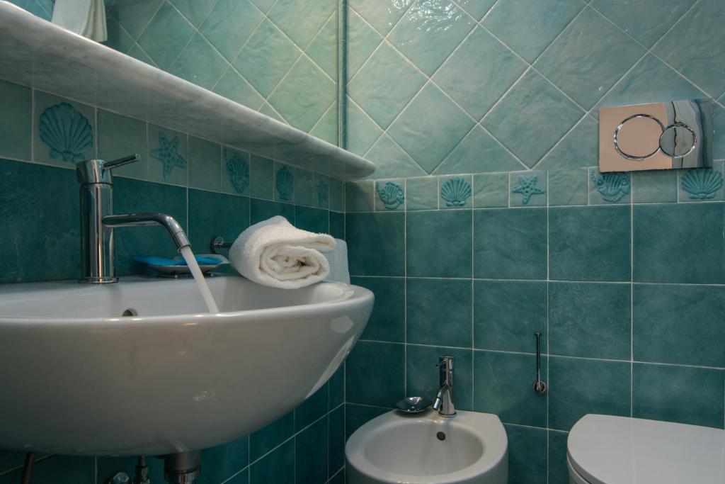 Koupelna v ubytování Hotel Doriana