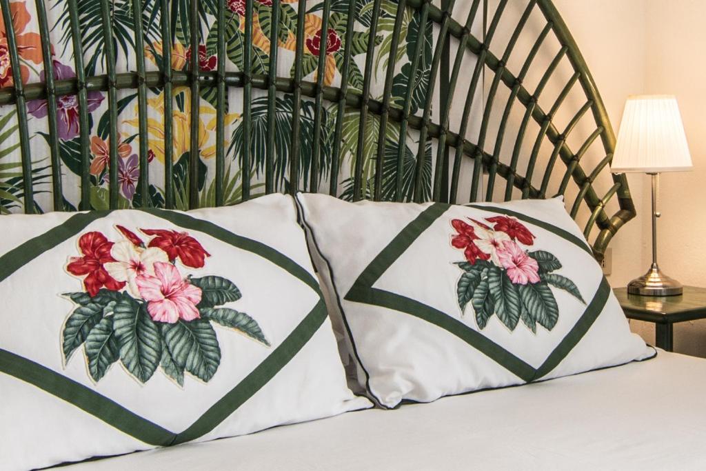 Postel nebo postele na pokoji v ubytování Hotel Doriana