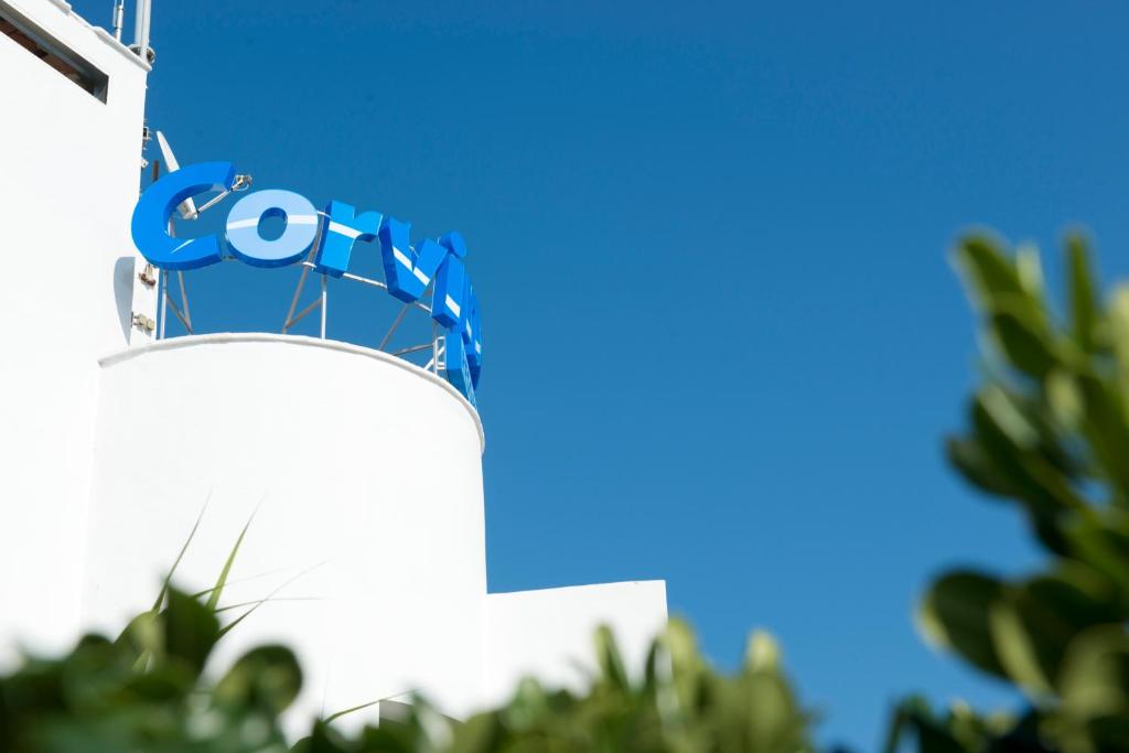 a sign for the google logo on top of a building at Corvino Resort in Monopoli