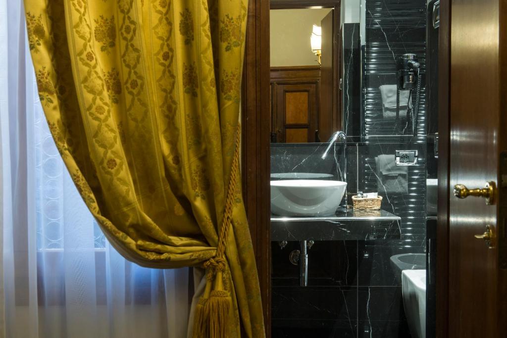 Koupelna v ubytování Hotel Campiello
